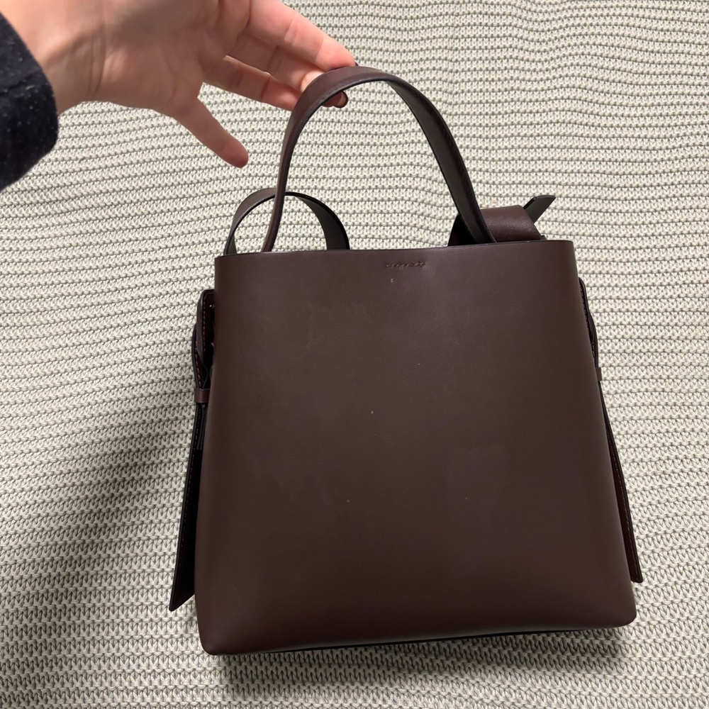 Brown leather purse with strap